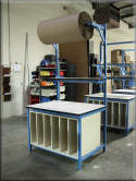 Packaging Table with Large Overhead Roll Holder & Lower Storage Cabinet